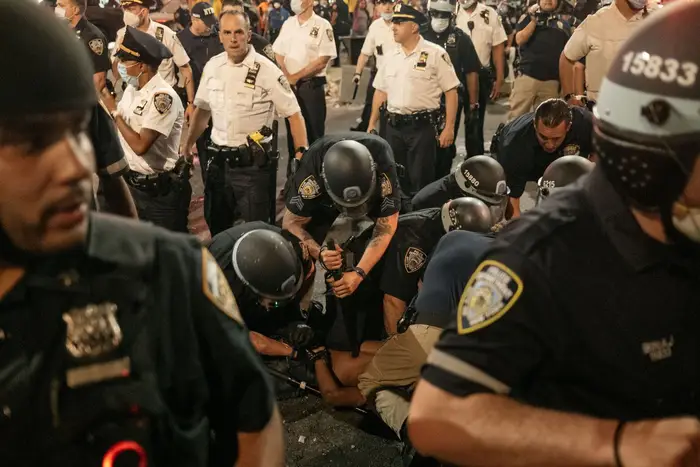 A protester is arrested by NYPD on May 30, 2020.
